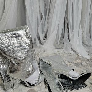 Jennifer Lee thigh knee boots